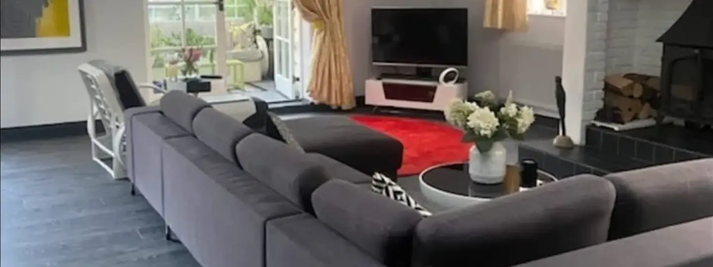 Warm wood effect laminate floor in a dining room