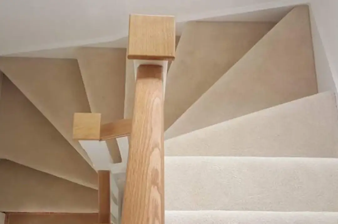 Carpeted staircase in a residential property